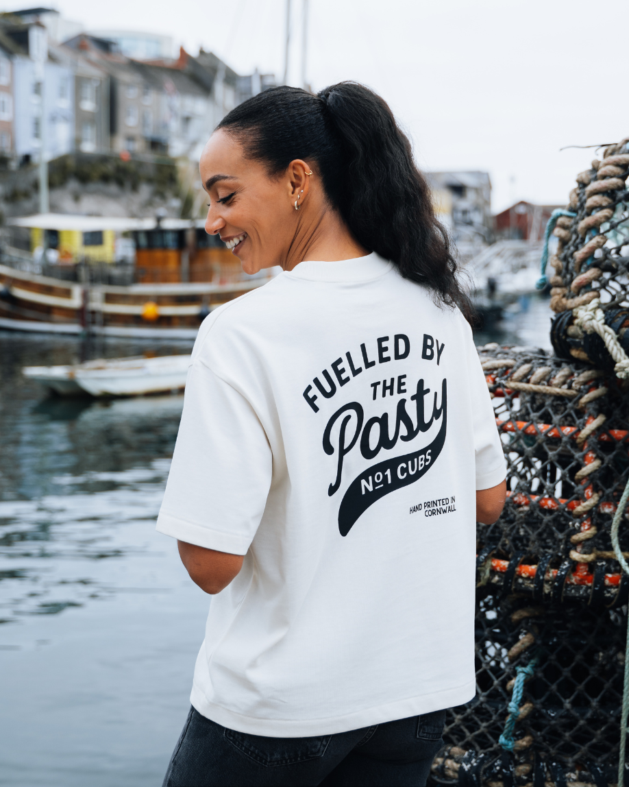 Woman wearing a white t-shirt with &