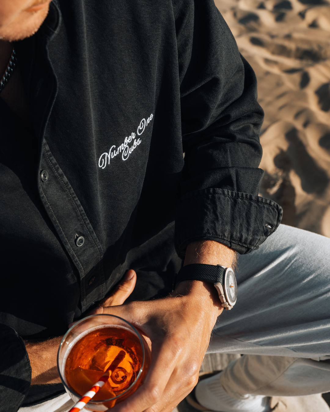 Detail shot of washed black cotton 360 gsm fabric – No.1 Cubs shirt