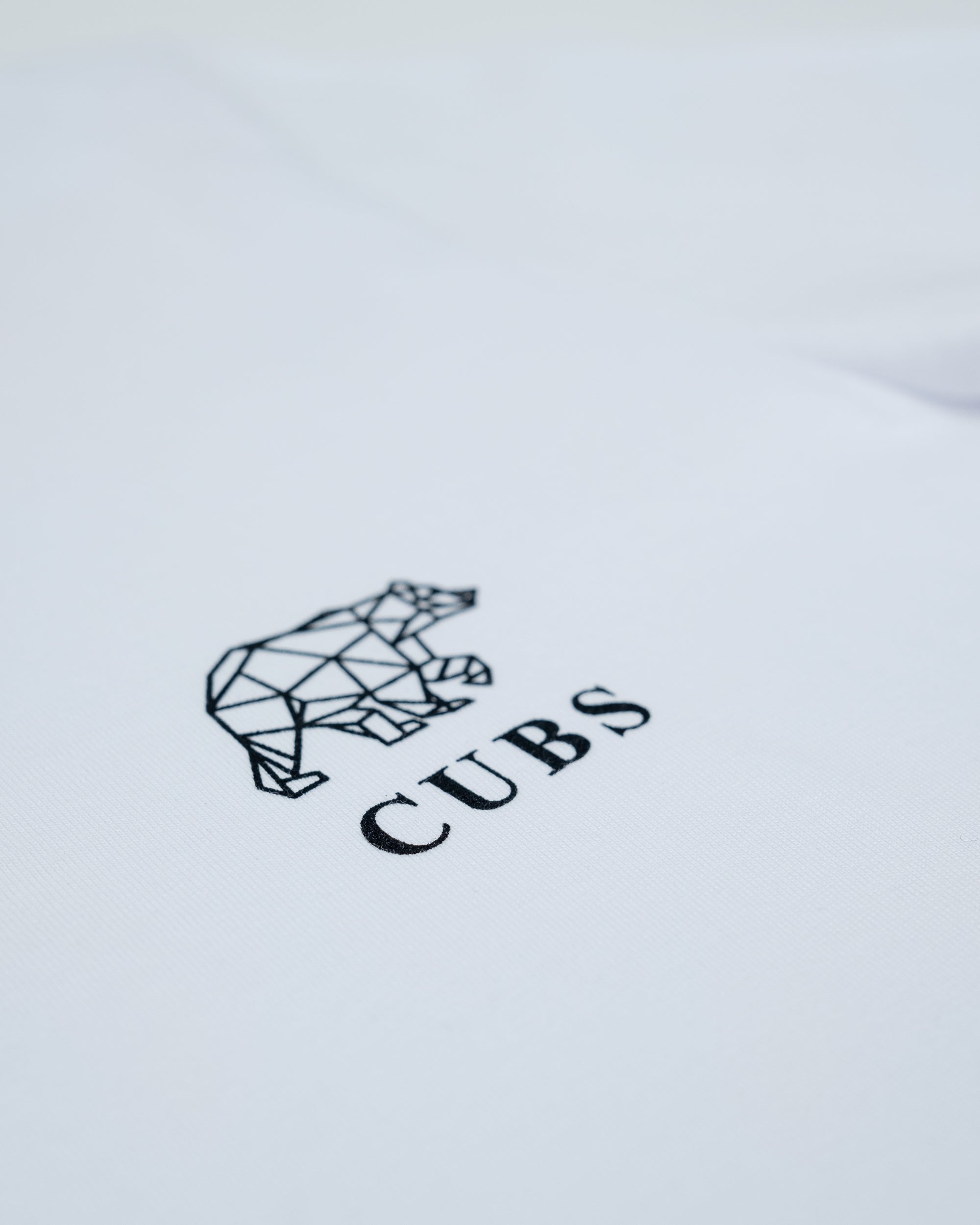 White Logo T-shirt by No1 Cubs featuring a simple and stylish design with the No1 Cubs logo on the chest. Made from premium, comfortable fabric, perfect for casual wear. Available in various sizes for all genders. Shop No1 Cubs for high-quality, branded casual clothing